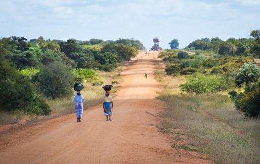 African women walking along a road